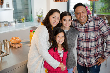 Portrait happy family in kitchen