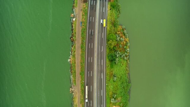 Bypass route along Khadzhybeiskyi lyman coast line Odessa, Ukraine, 2021. Sea and liman, firth at Ukraine south. Anamorphic Lens.