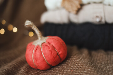 halloween and autumn cozy composition with pumpkins, october home decoration