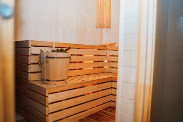 Fototapeta na wymiar Interior details Finnish sauna Steam bath with traditional sauna accessories