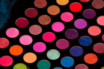palette of many colors for makeup with its accessories