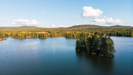 A view from the height of a drone flight to the Ural Mountains and the summer forest.