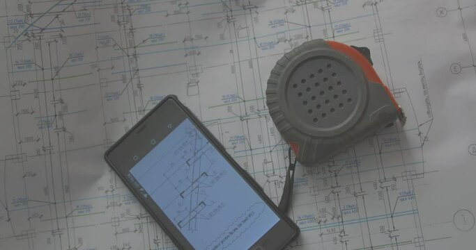 The idea of using digital information received from a mobile phone and printed documentation in modern design and construction.