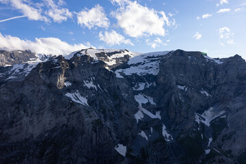 Amazing view to the peaks of the alps in Switzerland. Beautiful scenery in one of the most beautiful place in the world. Snow covered peaks and a blue sky.