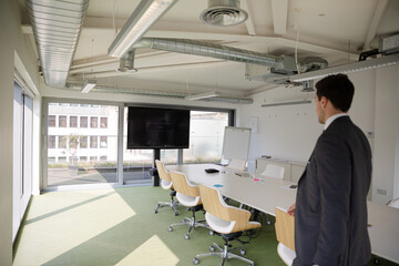 Business people gathering in conference room meeting
