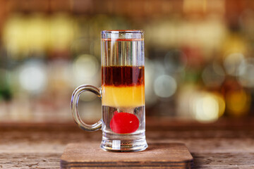 Cocktail shot based on gin and martini rosso