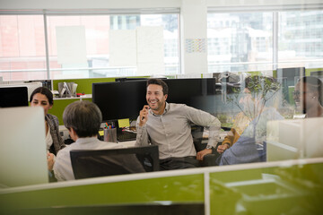 Fototapeta premium Business people talking in open plan office