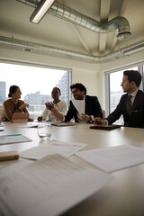 Business people brainstorming in conference room