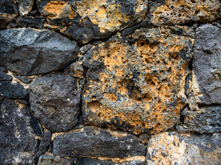 texture detail wall volcanic stone black and brown