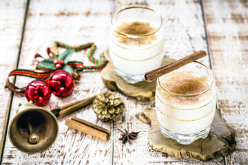 winter drink made with eggs, liqueur and cinnamon, called eggnog, coquito or Auld Man's milk