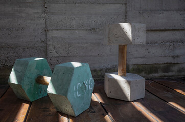 Set of design cement dumbells for exercise at home
