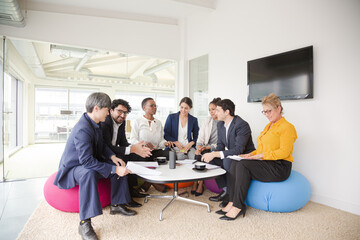 Business people talking in relax zone