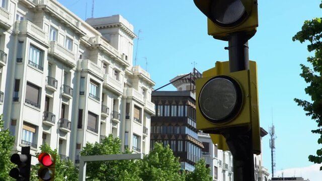 Spanish bicycle traffic lights change colors at intersection street. Traveling with bikes at Zaragoza concept background. Cyclists in traffic road at Spain. Rules for a bicycles-Dan