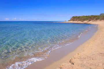 The long  beach of Punta Prosciutto in Apulia (Italy) stretches inside the Nature Park “Palude del Conte e Duna Costiera”, offering a corner of paradise, lapped by shallow and crystal clear water.