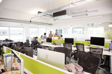 Business people meeting in open plan office