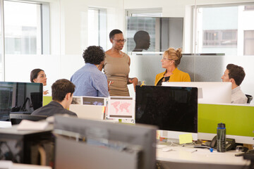 Business people meeting in open plan office