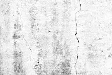 Texture of a concrete wall with cracks and scratches which can be used as a background