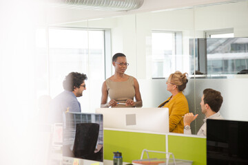 Business people meeting in open plan office