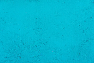 Blue wall texture with reliefs. Closeup. Blue background.