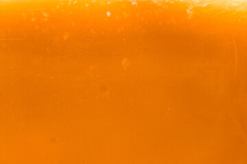 Orange texture with marks. Close up. Orange background.
