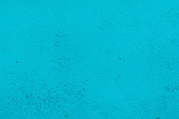 Blue wall texture with reliefs. Closeup. Blue background.