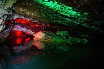 Colorful underground Prometheus Cave river formations boat tour in Georgia