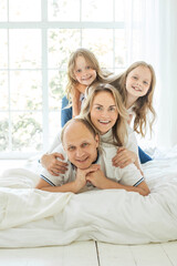 Obraz premium Happy family having fun time at home