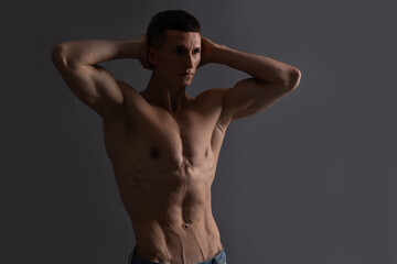 Fototapeta premium Shirtless and bare-chested. Shirtless man grey background. Fit guy with muscular torso