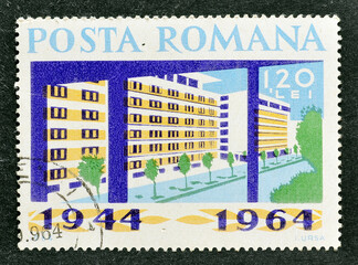 Cancelled postage stamp printed by Romania, that shows Block of flats, celebrating 
20th...