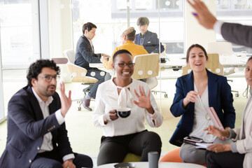 Business people brainstorming in relax zone