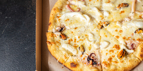 pizza seafood mussels, shrimps, octopus, scallop, cheese fresh portion ready to eat meal snack on the table copy space food background rustic. top view