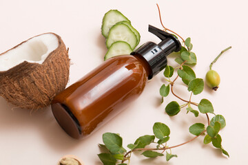 Natural cosmetic products on a beige background. Cosmetic bottle mockup.