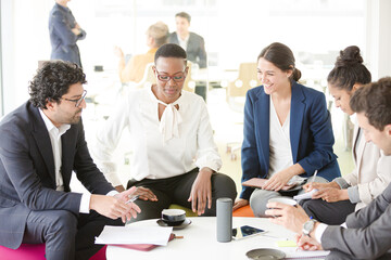 Business people brainstorming in relax zone