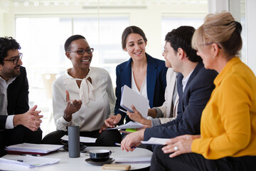 Enthusiastic business people working together in relax zone