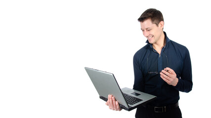 Funny handsome man with laptop. White background.