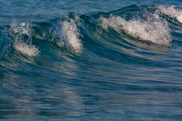 Ocean wave hits the shore of a Cuban beach