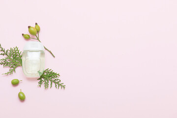 Natural cosmetic products on a pink background. Cosmetic bottle mockup.