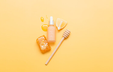 Natural cosmetic products on a yellow background. Cosmetic bottle mockup.
