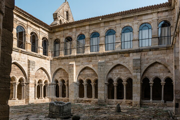 Fototapeta na wymiar Palencia, Spain - August 21, 2021. Cloister of the Santa Maria la Real monastery, Aguilar de Campoo, Palencia, Spain