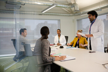 Businessman leading conference room meeting