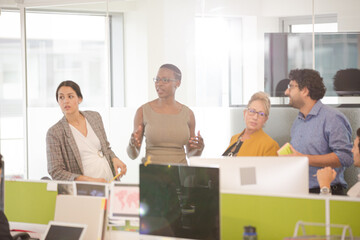 Fototapeta premium Business people talking in open plan office
