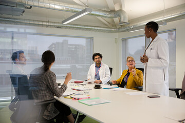 Fototapeta premium Businesswoman leading conference room meeting