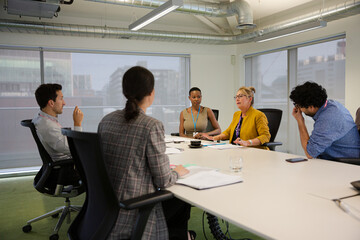Business people in conference room meeting