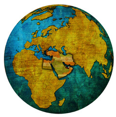 map of UAE territory located in middle east region with country flags over globe map