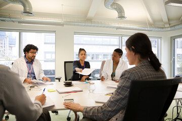 Business people in conference room meeting
