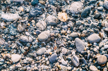 Beautiful pebbles in the water.