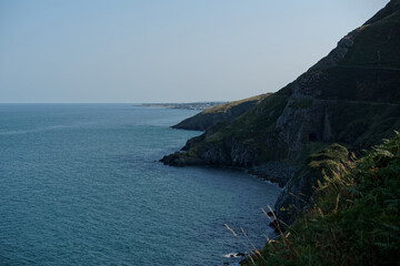 Naklejka premium Seascape with Irish Sea and cliffs in County Wicklow, Ireland