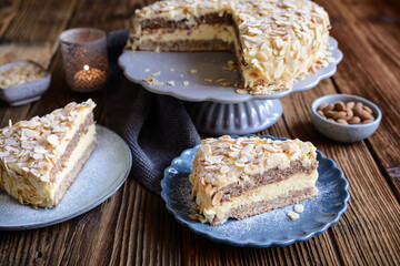 Mandeltarta, creamy Swedish almond cake topped with toasted almond flakes