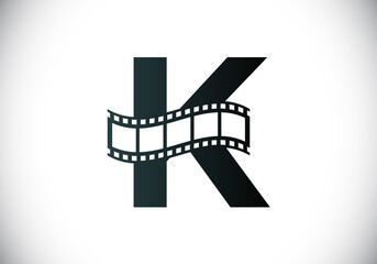 Fototapeta na wymiar Initial K monogram alphabet incorporated with film reel. Video and movie logo concept. Font emblem. Logo for the entertainment business and company identity