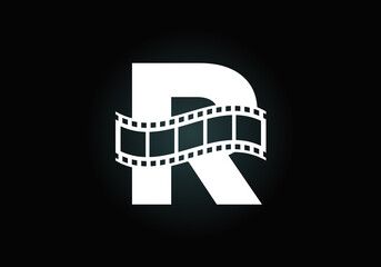 Fototapeta na wymiar Initial R monogram alphabet incorporated with film reel. Video and movie logo concept. Font emblem. Logo for the entertainment business and company identity